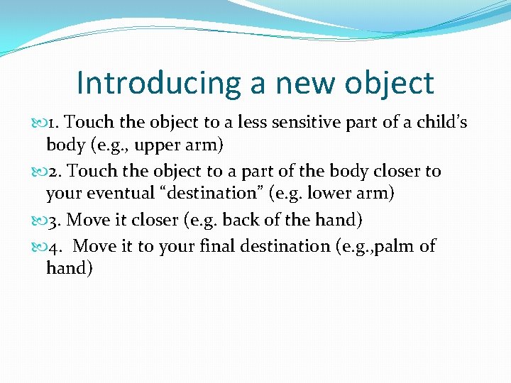 Introducing a new object 1. Touch the object to a less sensitive part of
