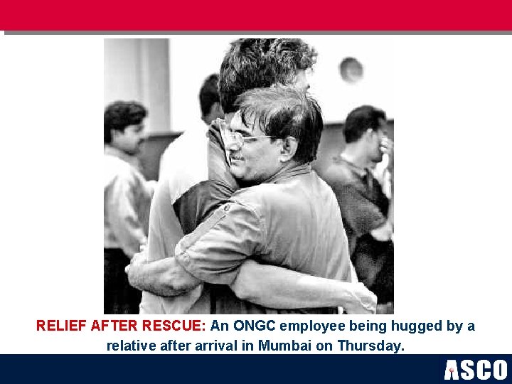 RELIEF AFTER RESCUE: An ONGC employee being hugged by a relative after arrival in