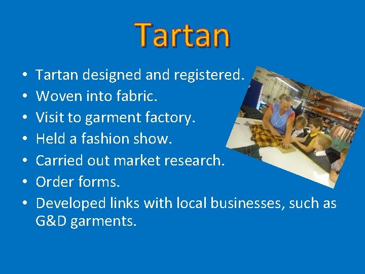 Tartan • • Tartan designed and registered. Woven into fabric. Visit to garment factory.