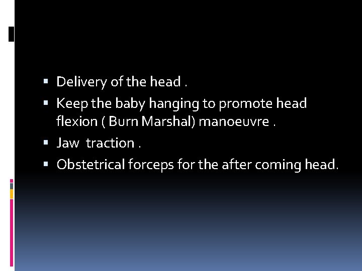  Delivery of the head. Keep the baby hanging to promote head flexion (
