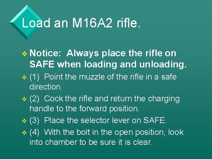 Load an M 16 A 2 rifle. v Notice: Always place the rifle on