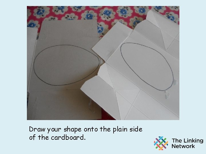 Draw your shape onto the plain side of the cardboard. 