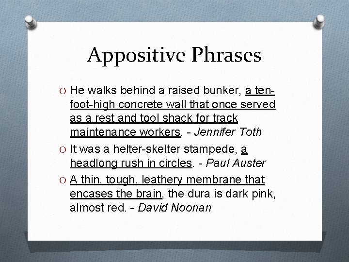 Appositive Phrases O He walks behind a raised bunker, a ten- foot-high concrete wall Appositive Phrases O He walks behind a raised bunker, a ten- foot-high concrete wall