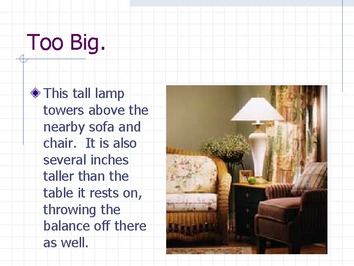 Too Big. This tall lamp towers above the nearby sofa and chair. It is