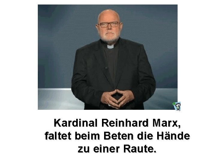 Kardinal Reinhard Marx, faltet beim Beten die Hände zu einer Raute. 