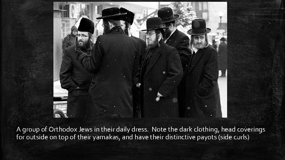 A group of Orthodox Jews in their daily dress. Note the dark clothing, head