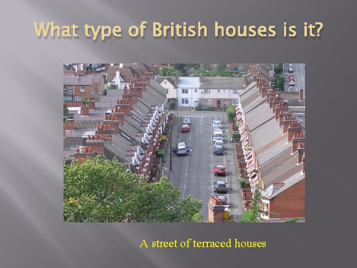 What type of British houses is it? A street of terraced houses 