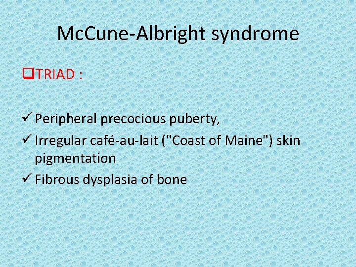 Mc. Cune-Albright syndrome q. TRIAD : ü Peripheral precocious puberty, ü Irregular café-au-lait ("Coast