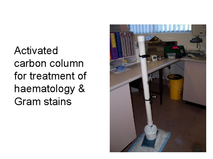 Activated carbon column for treatment of haematology & Gram stains 