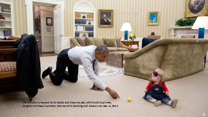 The president dropped to his hands and knees to play with Evelyn Cushman, daughter