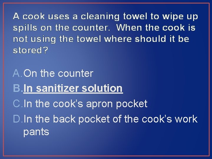 A cook uses a cleaning towel to wipe up spills on the counter. When