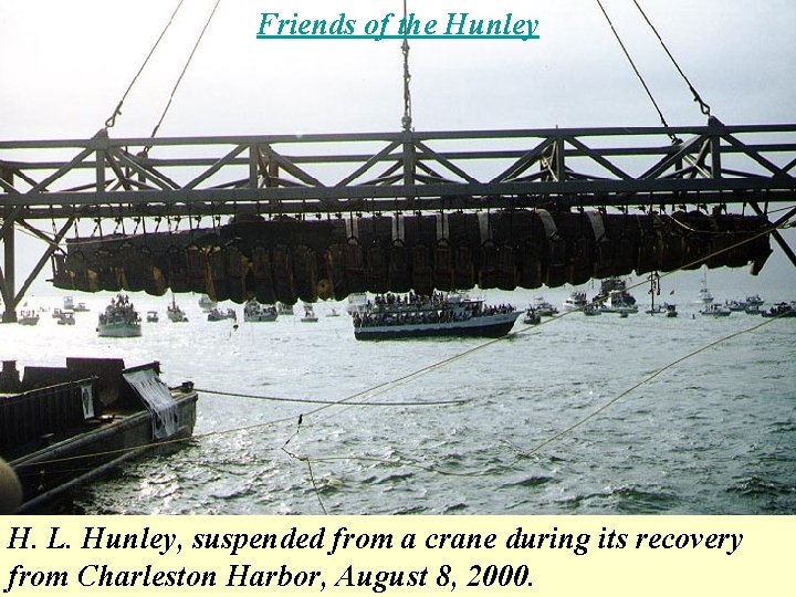 Friends of the Hunley H. L. Hunley, suspended from a crane during its recovery