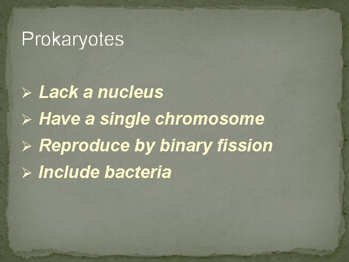 Prokaryotes Ø Lack a nucleus Ø Have a single chromosome Ø Reproduce by binary Prokaryotes Ø Lack a nucleus Ø Have a single chromosome Ø Reproduce by binary