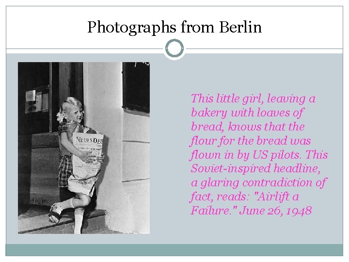 Photographs from Berlin This little girl, leaving a bakery with loaves of bread, knows