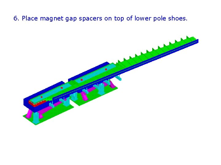 6. Place magnet gap spacers on top of lower pole shoes. 