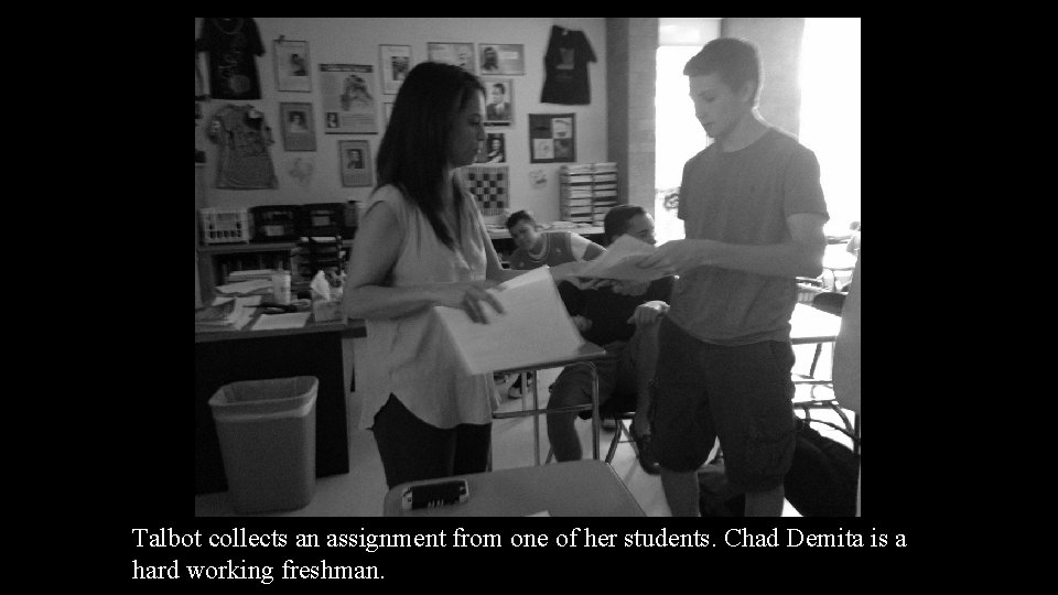 Talbot collects an assignment from one of her students. Chad Demita is a hard