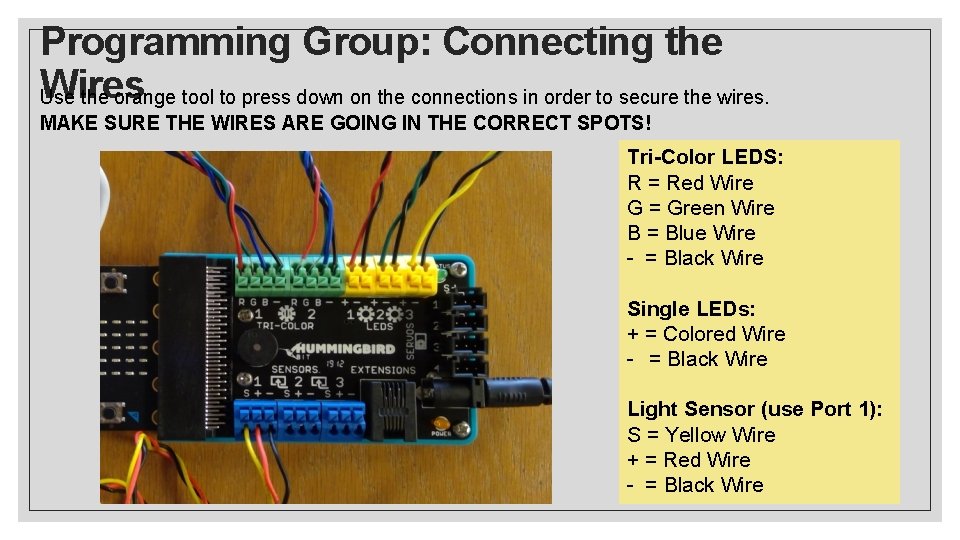 Programming Group: Connecting the Wires Use the orange tool to press down on the