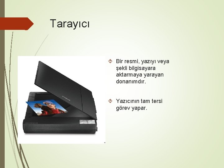 Tarayıcı Bir resmi, yazıyı veya şekli bilgisayara aktarmaya yarayan donanımdır. Yazıcının tam tersi görev