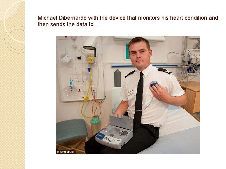 Michael Dibernardo with the device that monitors his heart condition and then sends the