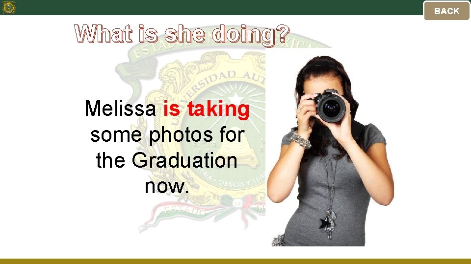 BACK What is she doing? Melissa is taking some photos for the Graduation now.