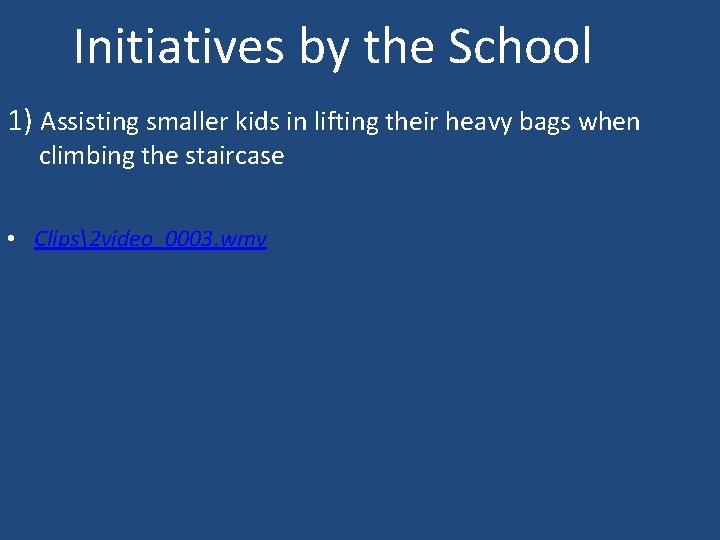 Initiatives by the School 1) Assisting smaller kids in lifting their heavy bags when