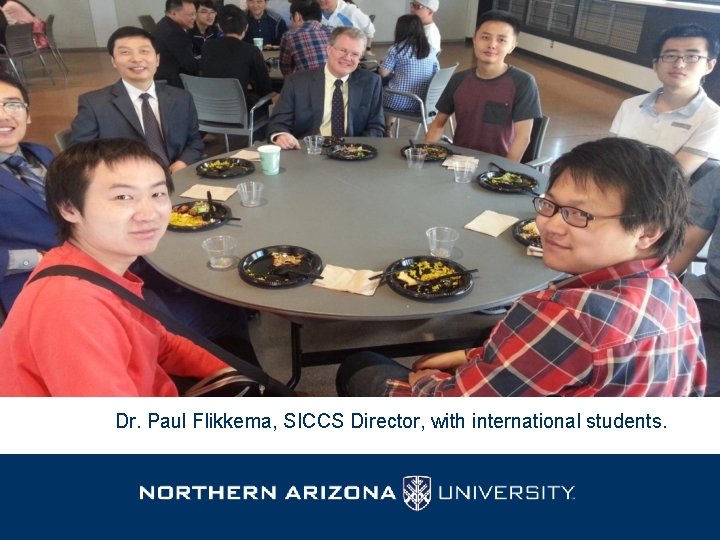 Dr. Paul Flikkema, SICCS Director, with international students. 