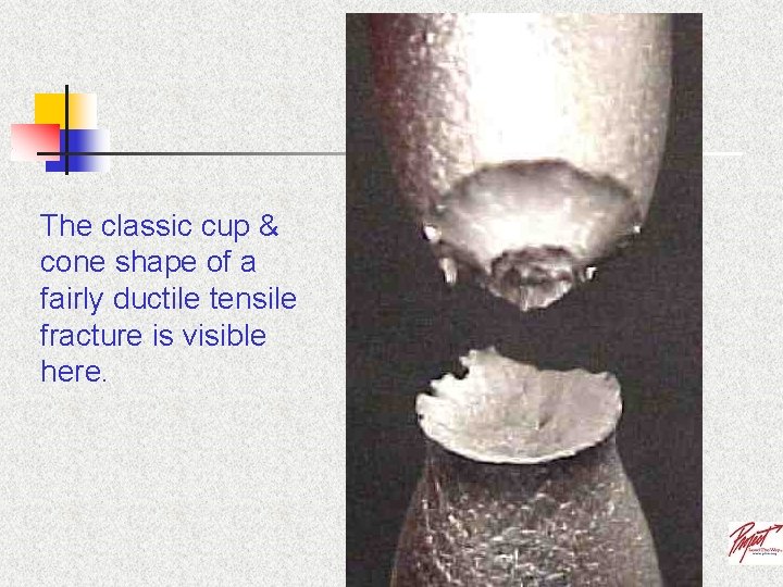 The classic cup & cone shape of a fairly ductile tensile fracture is visible