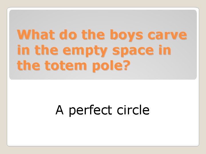 What do the boys carve in the empty space in the totem pole? A
