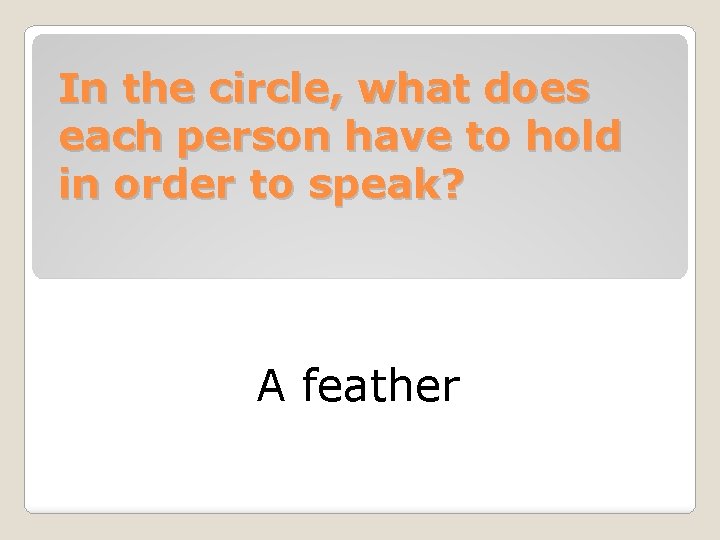 In the circle, what does each person have to hold in order to speak?