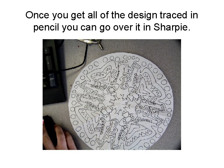 Once you get all of the design traced in pencil you can go over