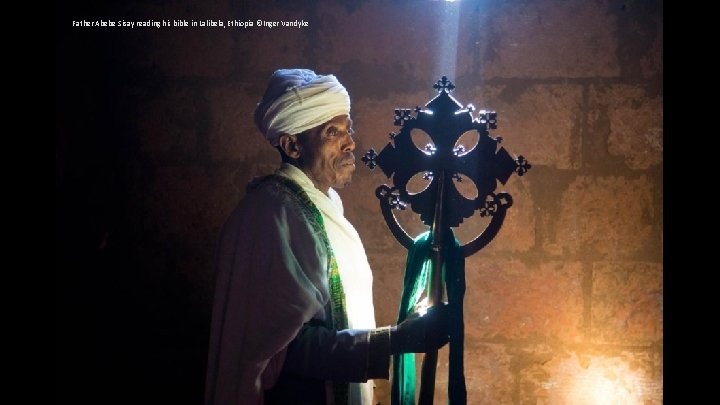 Father Abebe Sisay reading his bible in Lalibela, Ethiopia ©Inger Vandyke 