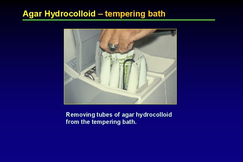 Agar Hydrocolloid – tempering bath Removing tubes of agar hydrocolloid from the tempering bath.