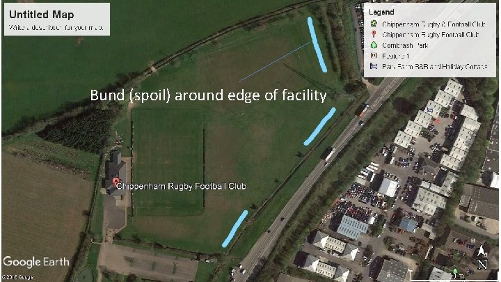 Bund (spoil) around edge of facility 