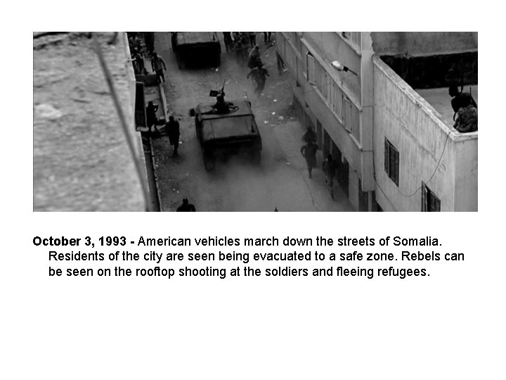 October 3, 1993 - American vehicles march down the streets of Somalia. Residents of