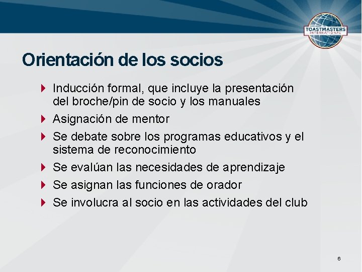 Orientación de los socios Inducción formal, que incluye la presentación del broche/pin de socio