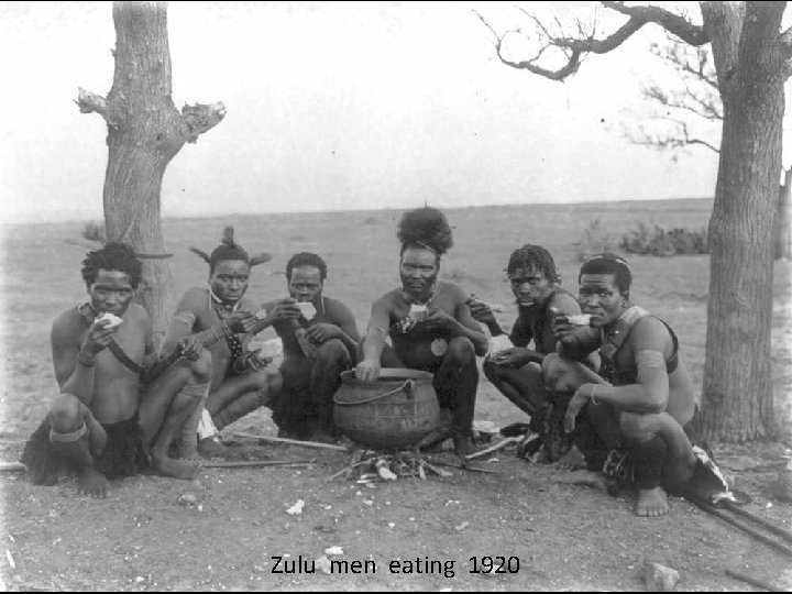 Zulu men eating 1920 