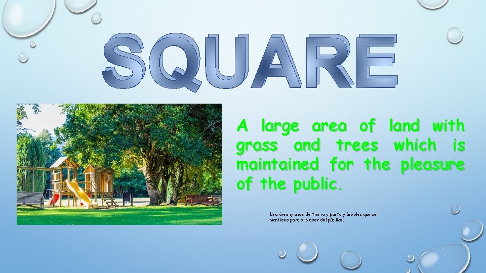 SQUARE A large area of land with grass and trees which is maintained for