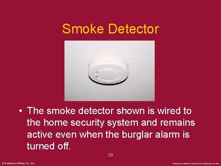 Smoke Detector • The smoke detector shown is wired to the home security system