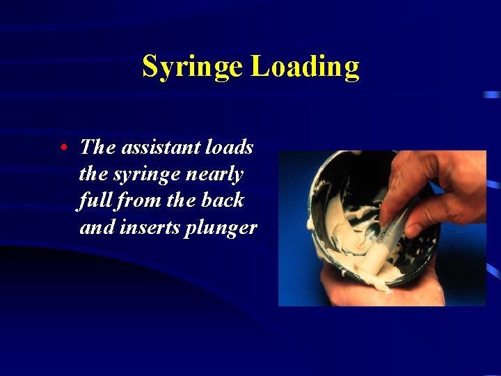 Syringe Loading • The assistant loads the syringe nearly full from the back and