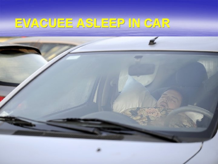  EVACUEE ASLEEP IN CAR 