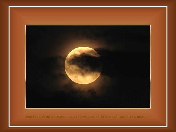 RUBELLES, SEINE-ET-MARNE. . . LA PLEINE LUNE SE DÉROBE DERRIÈRE LES NUAGES. 