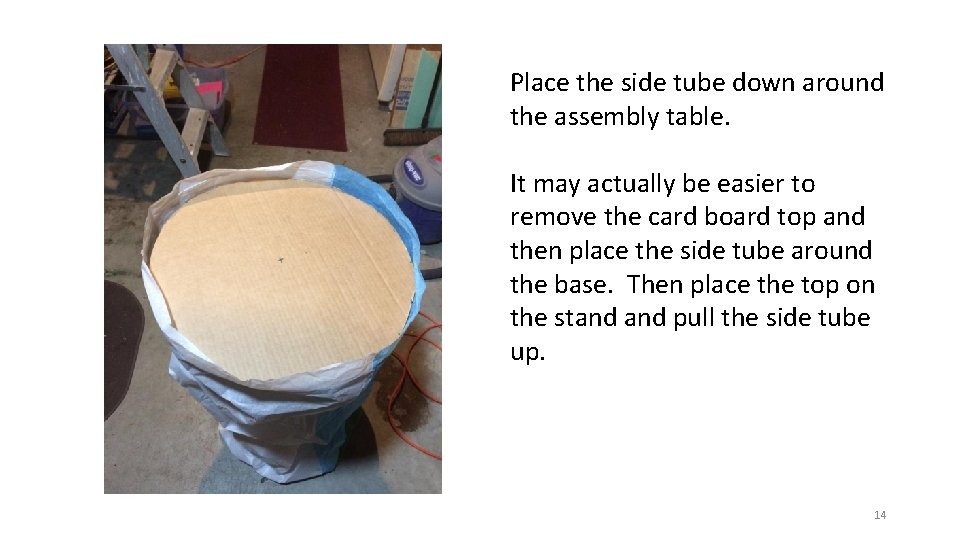 Place the side tube down around the assembly table. It may actually be easier