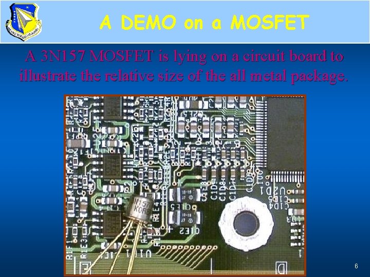 A DEMO on a MOSFET A 3 N 157 MOSFET is lying on a