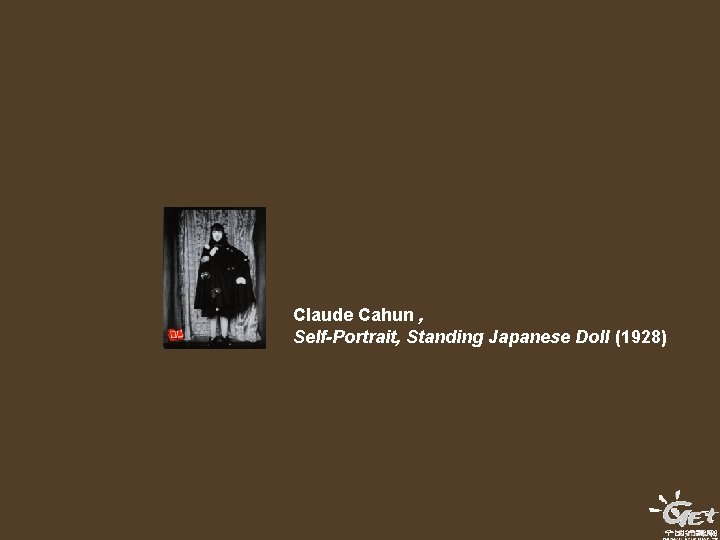 Claude Cahun , Self-Portrait, Standing Japanese Doll (1928) 