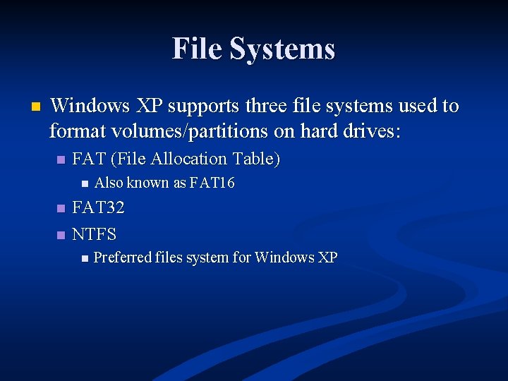 File Systems n Windows XP supports three file systems used to format volumes/partitions on