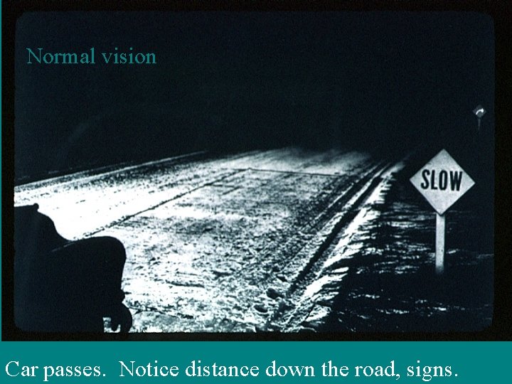 Normal vision Car passes. Notice distance down the road, signs. 