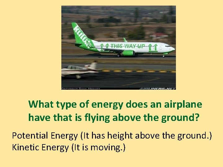 What type of energy does an airplane have that is flying above the ground?