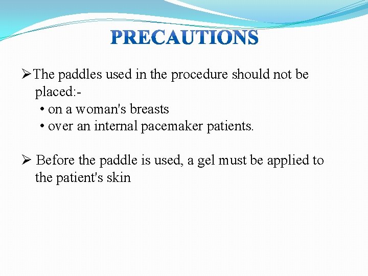 ØThe paddles used in the procedure should not be placed: • on a woman's
