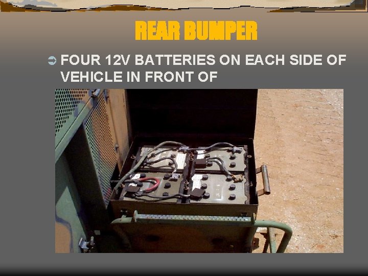 REAR BUMPER Ü FOUR 12 V BATTERIES ON EACH SIDE OF VEHICLE IN FRONT