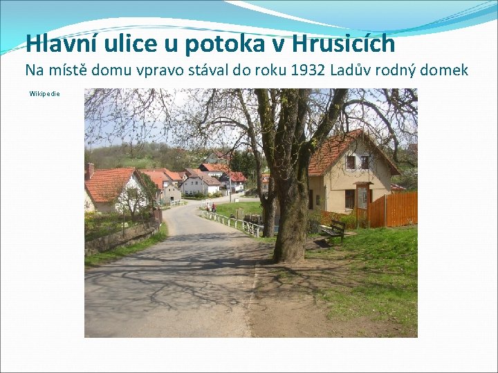 Hlavní ulice u potoka v Hrusicích Na místě domu vpravo stával do roku 1932